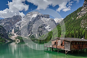 Seekofel and lake Braies (Pragser Wildsee) in june photo