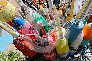 Seen from avobe are colorful, wooden fishing buoys