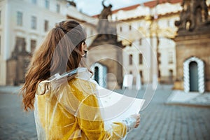 Seen from behind woman in blouse in Prague Czech Republic