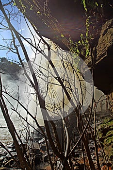 Seen water falling from bottom of cascade behind the fall. Chapada das Mesas, Maranhao photo