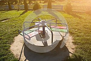 Seesaw on children playground. Outdoors games for kids. Summer day