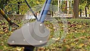 Seesaws and swings in the background slow motion