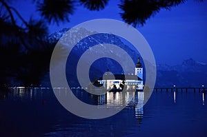 Lake castle Ort on Traunsee at the blue hour, Austria, Europe photo