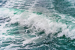 Seething atlantic sea water with foam, jet, stream Cape Cod