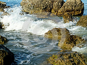 Seething waves on a rocky pebble sea