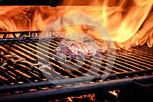 Sef roasts grilled meat. Close-up