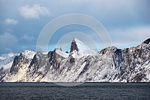 Segla snowy mountain peak in ocean