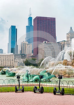 Segway PT self-balancing scooter in front of Buckingham Memorial Fountain in Chicago Grant Park, US