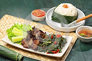 Sei sapi served on rectangle plate