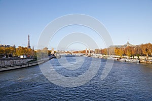 Seine river view with Eiffel tower and Alexander III bridge wide angle view, autumn day in Paris