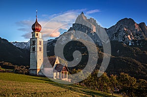 Seis am Schlern, Italy - Famous St. Valentin Church and Mount Sciliar mountain at background in Italian Dolomites