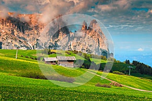 Seiser Alm resort and Mount Sciliar in background, Dolomites, Italy photo