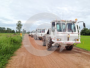 Seismic vibrator trucks vibroseis shooting for land seismic survey for oil and gas exploration photo
