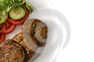 Seitan with vegetables isolated on white background. Fake meat.