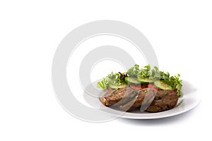 Seitan with vegetables on isolated on white background. Fake meat.