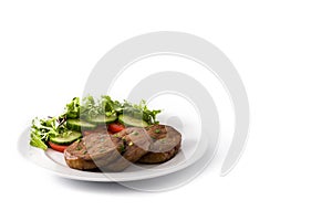 Seitan with vegetables on isolated on white background. Fake meat.