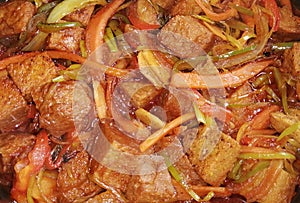 SeitÃÂ¡n con verduras en salsa de soja y jengibre photo