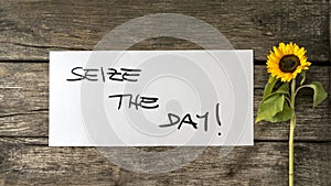 Seize the day message written on white card