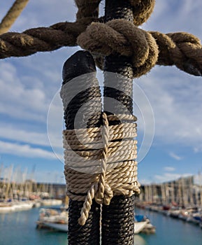 Seizing knot fastening the shrouds of an old sailing vessel photo