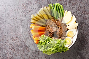 Selat Solo Javanese style beef steak, popular in Solo Central Java closeup in the bowl. Horizontal top view