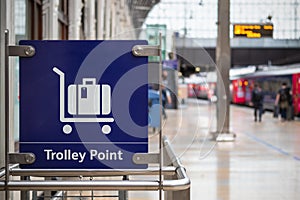 Sign of trolley point at London Paddington station