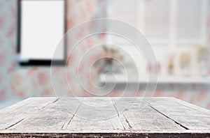 Selected focus empty brown wooden table and Coffee shop blur background with bokeh image. for your photomontage or product display