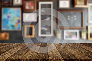 Selected focus empty brown wooden table and Coffee shop or restaurant blur background with bokeh image. for your photomontage or