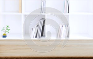 Selected focus empty old wooden table and Library or Bookstore