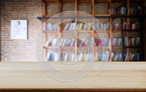 Selected focus empty old wooden table and Library or Bookstore