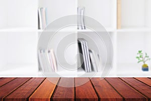 Selected focus empty old wooden table and Library or Bookstore