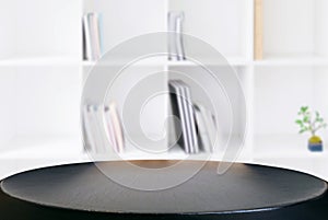 Selected focus empty old wooden table and Library or Bookstore