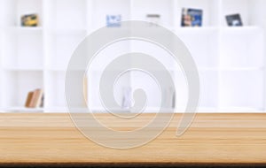 Selected focus empty old wooden table and .Library or Bookstore blur background with bokeh image. for your photomontage or product