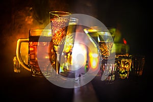 Selection of alcoholic drinks on rustic wood background. Creative artwork decoration