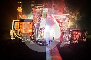 Selection of alcoholic drinks on rustic wood background. Creative artwork decoration