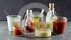 Selection of assorted sauces and dressings photo