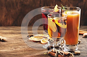 Selection of autumn or winter seasonal alcoholic hot cocktails - mulled wine, glogg, grog, eggnog, warm ginger ale, hot buttered