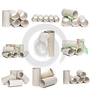 A selection of cardboard toilet paper tubes in various arrangements isolated on a white background