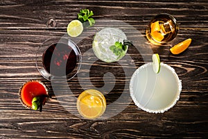Selection of classic cocktails - cosmopolitan, mojito, bloody mary, old fashioned, margarita, aperol