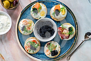 Selection of cocktail blinis - gourmet party food