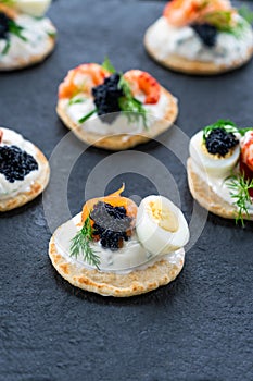 Selection of cocktail blinis - gourmet party food