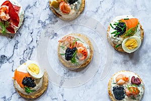 Selection of cocktail blinis - gourmet party food