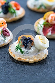 Selection of cocktail blinis - gourmet party food
