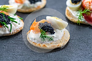 Selection of cocktail blinis - gourmet party food