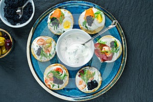 Selection of cocktail blinis - gourmet party food