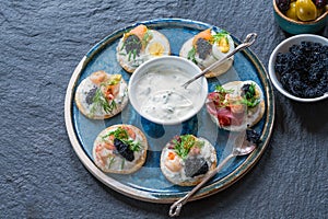 Selection of cocktail blinis - gourmet party food