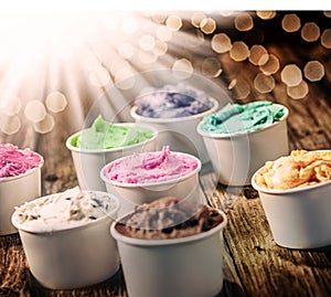 Selection of colorful tubs of ice cream photo