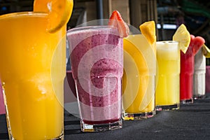 A selection of Fruit shakes displayed together in formation photo