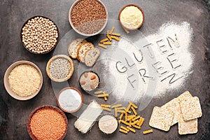 Selection of gluten free food on a rustic background. A variety of grains, flours, pasta, and bread gluten-free. Top view, flat