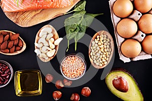 Selection of healthy food for heart, life concept with eggs and avocado on background