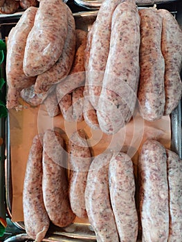 Selection of high quality meat products of sausages chicken lamb pork beef pheasant duck geese at the privately owned butchers